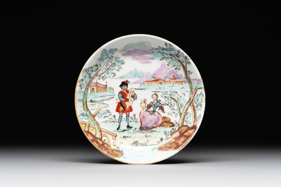 A Dutch-decorated Chinese porcelain cup and saucer with figures in a landscape, 18th C.
