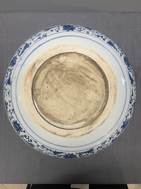 A large Chinese blue, white and copper-red 'carp' dish, 19/20th C.