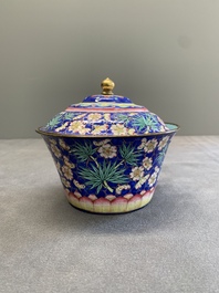 A pair of Chinese Canton enamel bowls and covers with floral design, Qianlong