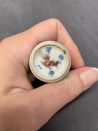 A Chinese blue, white and copper-red 'fisherman' snuff bottle, Qing Yang Dao Ren 卿陽道人 mark, 19th C.