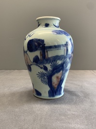 A Chinese blue, white and copper-red 'kylin and phoenix' vase, 19th C.