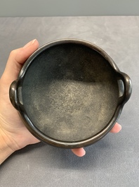 A Chinese bronze tripod censer, Xuande mark, 17/18th C.