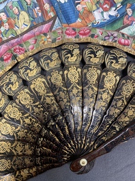 Two Chinese Canton gilt-lacquered and painted paper fans, one with original box, 19th C.