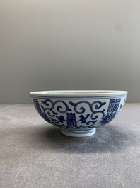 A Chinese blue and white 'fu and shou' bowl with flower scrolls, Yongzheng mark and of the period