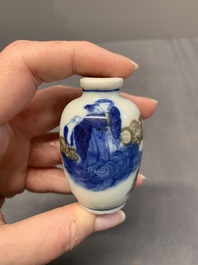 Four Chinese blue, white and copper-red snuff bottles, Yongzheng and Qianlong mark, 19th C.