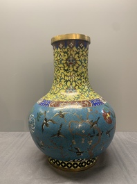 A pair of large Chinese cloisonn&eacute; 'magpies among flowering branches' vases, 19th C.