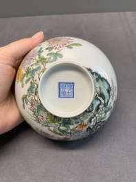 A pair of Chinese famille rose eggshell bowls with floral design, Qianlong mark, 20th C.