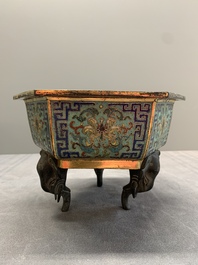 A pair of Chinese cloisonn&eacute; 'lotus and elephant' jardini&egrave;res, 18/19th C.