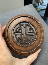 A Chinese famille rose '100 boys' jar and wooden cover, 19th C.