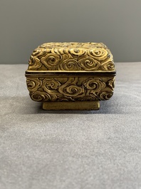 A Chinese square gilt bronze ink box and cover (印泥盒), Xuande mark and possibly of the period