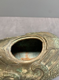 A rare Chinese inscribed bronze tapir-form vessel and cover, 'xizun 犧尊', late Ming/early Qing