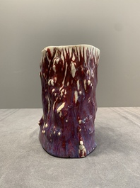 A Chinese flamb&eacute;-glazed trunk-shaped brush pot, 19th C.