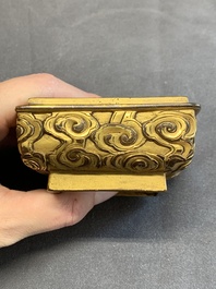 A Chinese square gilt bronze ink box and cover (印泥盒), Xuande mark and possibly of the period