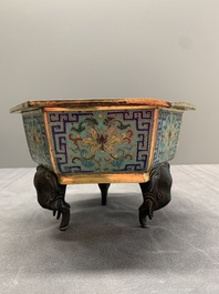 A pair of Chinese cloisonn&eacute; 'lotus and elephant' jardini&egrave;res, 18/19th C.