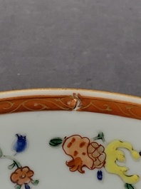 A Chinese famille rose 'antiquities' dish and two plates, Yongzheng/Qianlong