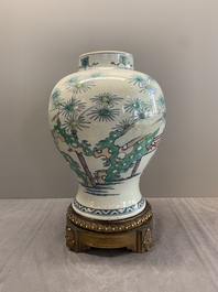 A Chinese doucai vase with gilt bronze mount, Chenghua mark, 19th C.