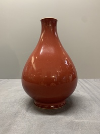 A Chinese copper-red-glazed pear-shaped vase, Yongzheng mark and of the period