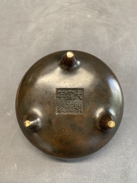 A Chinese bronze tripod censer, Xuande mark, 17/18th C.