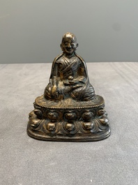A Tibetan bronze Padmasambhava, 14th C.