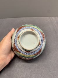Two Dutch-decorated Chinese blue and white bowls with figures and landscapes, Qianlong