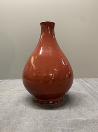 A Chinese copper-red-glazed pear-shaped vase, Yongzheng mark and of the period