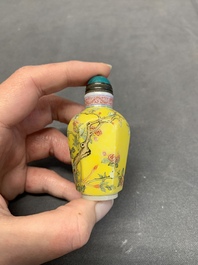 Three Chinese famille rose snuff bottles and two painted glass snuff bottles, Qianlong and Jujiutang mark, 19/20th C.