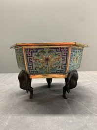 A pair of Chinese cloisonn&eacute; 'lotus and elephant' jardini&egrave;res, 18/19th C.