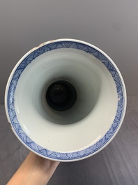 A Chinese blue and white 'landscape' 'gu' vase, Kangxi