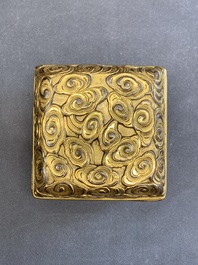 A Chinese square gilt bronze ink box and cover (印泥盒), Xuande mark and possibly of the period