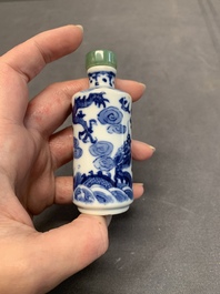 A Chinese blue and white 'dragon' snuff bottle and a polychrome 'peacock' snuff bottle, Yongzheng mark, 19/20th C.