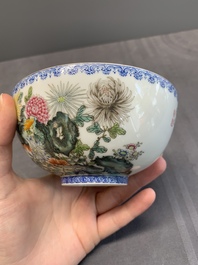 A pair of Chinese famille rose eggshell bowls with floral design, Qianlong mark, 20th C.