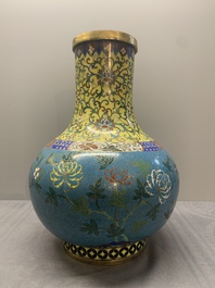 A pair of large Chinese cloisonn&eacute; 'magpies among flowering branches' vases, 19th C.