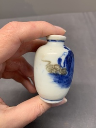 Four Chinese blue, white and copper-red snuff bottles, Yongzheng and Qianlong mark, 19th C.