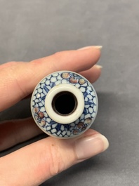 Four Chinese blue, white and copper-red snuff bottles, Yongzheng and Qianlong mark, 19th C.