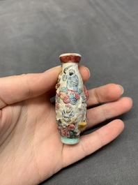 Two Chinese famille rose molded snuff bottles with figural design, Qianlong mark, 19th C.