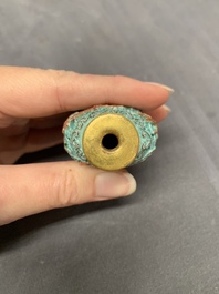 A Chinese moulded turquoise-ground famille rose 'dragon and phoenix' snuff bottle, 19th C.