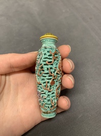 A Chinese moulded turquoise-ground famille rose 'dragon and phoenix' snuff bottle, 19th C.