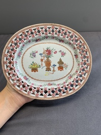 A Chinese openworked famille rose 'antiquities' basket and stand, Qianlong