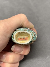 A Chinese moulded turquoise-ground famille rose 'dragon and phoenix' snuff bottle, 19th C.