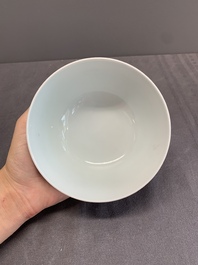 A Chinese black-ground famille rose 'flower scroll' bowl, Qianlong mark and of the period