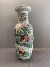 A pair of Chinese famille rose '18 luohan' vases with relief design, 19th C.