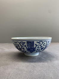 A Chinese blue and white 'fu and shou' bowl with flower scrolls, Yongzheng mark and of the period