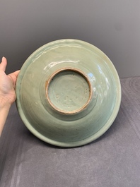 A Chinese Longquan celadon 'lotus' dish, Ming