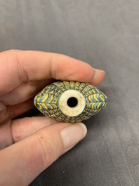 A Chinese blue and white 'dragon' snuff bottle and a polychrome 'peacock' snuff bottle, Yongzheng mark, 19/20th C.