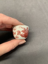 A small Chinese blue, white and copper-red 'dragon' wine cup, Lang Jin Ge Zhi 郎唫閣製 mark, 19/20th C.