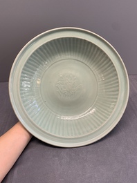 A Chinese Longquan celadon 'lotus' dish, Ming