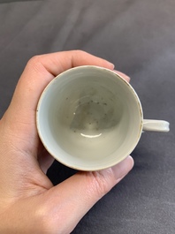 A fine Chinese famille rose armorial cup and two saucers, Yongzheng/Qianlong