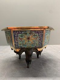 A pair of Chinese cloisonn&eacute; 'lotus and elephant' jardini&egrave;res, 18/19th C.