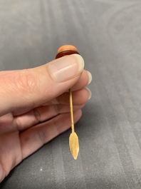 Two Chinese blue and white 'riders on horseback' snuff bottles, Yongzheng mark, 19th C.