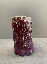 A Chinese flamb&eacute;-glazed trunk-shaped brush pot, 19th C.